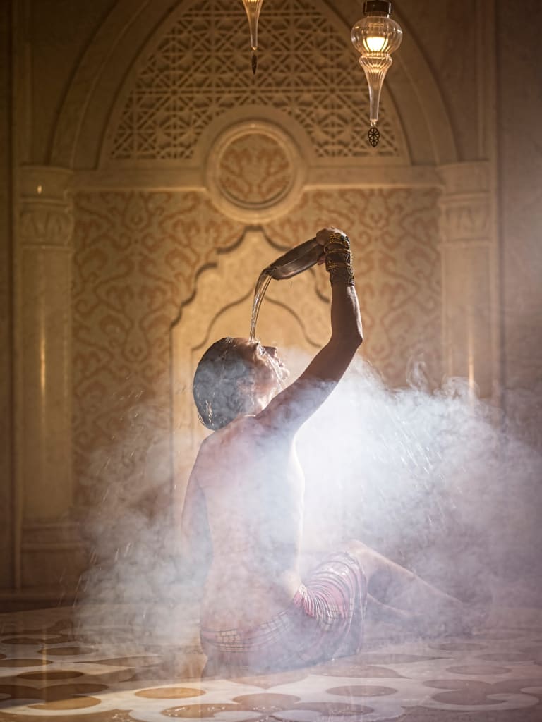 Future of wellness trend woman in urban bathhouse Turkish hammam